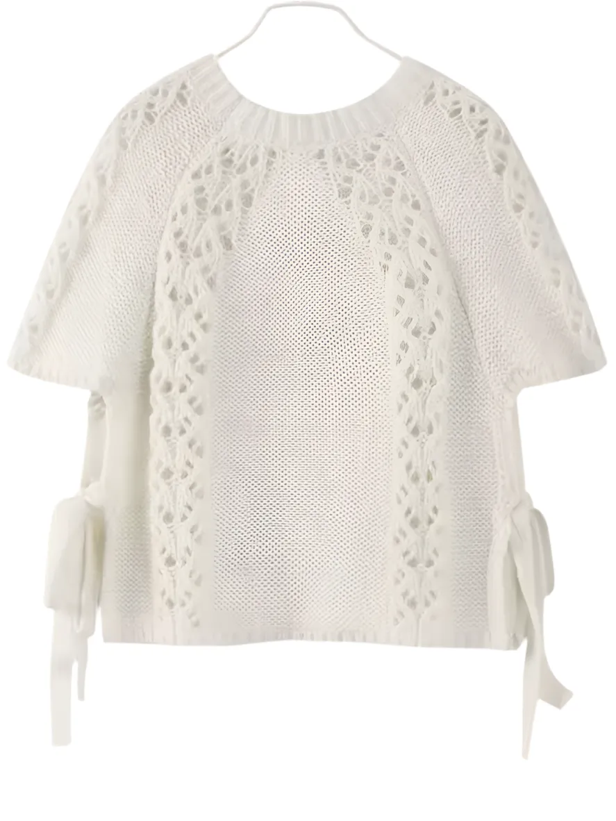 White sleeveless sweater pullover